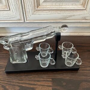 Berzat Barware pistol-shaped whiskey decanter set.